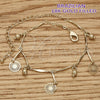 Oro Laminado Charm Anklet , Gold Filled Style Flower and Twist Design, Polished, Golden Finish, 03.105.0031.10 (08 MM Thickness, 10 Inches Length)