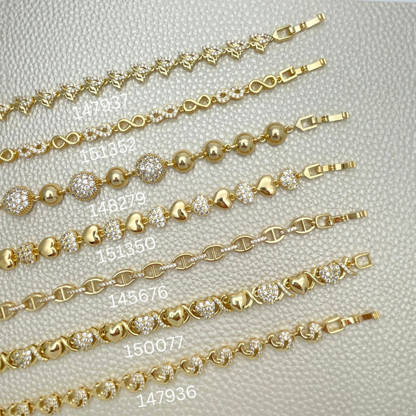 15 elegantes brazaletes de moda con zirconio ($6.67 cada uno) por $100 en capas de oro