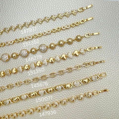 15 elegantes brazaletes de moda con zirconio ($6.67 cada uno) por $100 en capas de oro