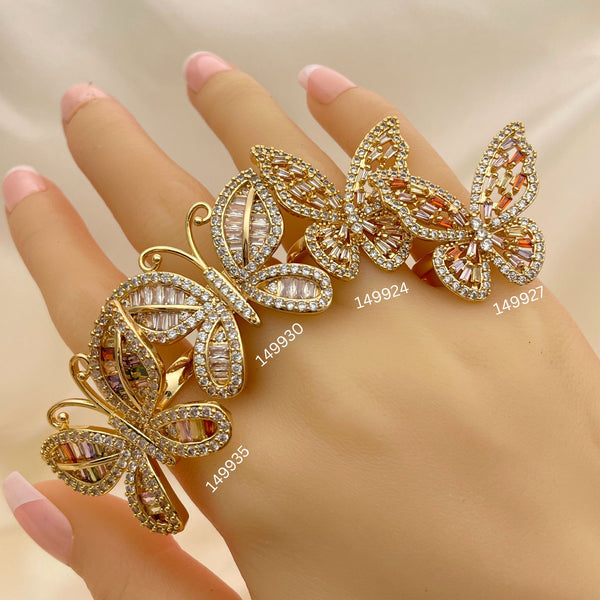 12 anillos mariposa XL surtidos en oro laminado por $100 ($8.33 c/u) en oro laminado