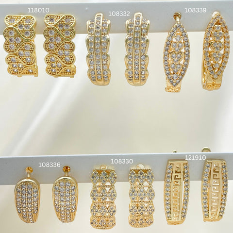 28 argollas Huggie grandes surtidas en Oro Laminado Gold Filled ($3.57 cada una) por $100 Gold Layered