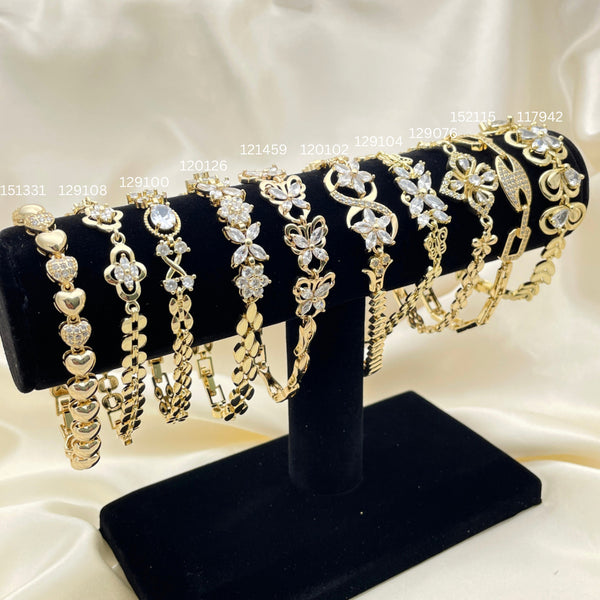 12 Brazaletes Carribbean Flex Surtidos en Oro Laminado Gold Filled ($8.33 cada uno) por $100 Gold Layered