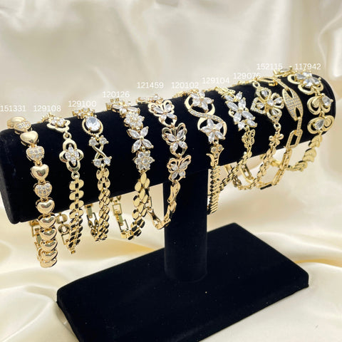 12 Brazaletes Carribbean Flex Surtidos en Oro Laminado Gold Filled ($8.33 cada uno) por $100 Gold Layered