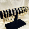 12 Brazaletes Carribbean Flex Surtidos en Oro Laminado Gold Filled ($8.33 cada uno) por $100 Gold Layered