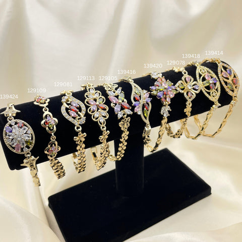 12 Brazaletes Carribbean Flex Surtidos en Oro Laminado Gold Filled ($8.33 cada uno) por $100 Gold Layered