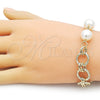 Oro Laminado Fancy Bracelet, Gold Filled Style Ball and Twist Design, with Ivory Pearl, Diamond Cutting Finish, Golden Finish, 03.331.0276.08 (14 MM Thickness, 9 Inches Length)