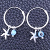 Sterling Silver Small Hoop, Evil Eye and Flower Design, with Aqua Blue Crystal, Polished, Silver Finish, 02.401.0037.15