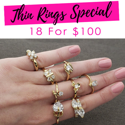 18 anillos medianos con circonitas cúbicas ($5.55 c/u) Estilos mixtos surtidos y tamaños mixtos Capas doradas