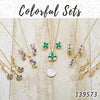 18 coloridos juegos de aretes, colgantes y collares en capas de oro ($5.55) c/u