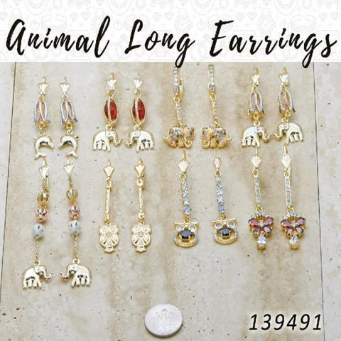 35 aretes largos de animales en capas de oro ($2.85) c/u