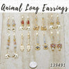 35 aretes largos de animales en capas de oro ($2.85) c/u