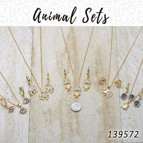 18 juegos de aretes, colgantes y collares de animales en capas de oro ($5.55) c/u