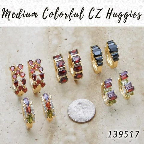 35 Huggies de circonitas de colores medianos en capas doradas ($2.85) c/u