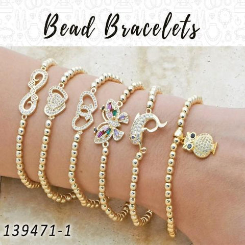 15 pulseras de cuentas expandibles en capas de oro ($6.67) c/u