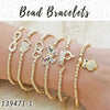 15 pulseras de cuentas expandibles en capas de oro ($6.67) c/u