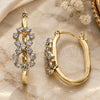 Oro Laminado Medium Hoop, Gold Filled Style Infinite Design, with White Cubic Zirconia, Polished, Golden Finish, 5.140.012