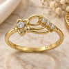 Oro Laminado Multi Stone Ring, Gold Filled Style Flower Design, with White Cubic Zirconia, Polished, Golden Finish, 5.165.033.06 (Size 6)