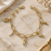 Oro Laminado Charm Bracelet, Gold Filled Style Shoes and Fish Design, Diamond Cutting Finish, Golden Finish, 5.019.008 (08 MM Thickness, 8 Inches Length)