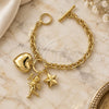 Oro Laminado Charm Bracelet, Gold Filled Style Angel and Heart Design, Diamond Cutting Finish, Golden Finish, 5.020.004 (06 MM Thickness, 7 Inches Length)
