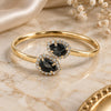 Oro Laminado Individual Bangle, Gold Filled Style Teardrop Design, with Black and White Cubic Zirconia, Polished, Golden Finish, 5.231.015 (05 MM Thickness, One size fits all)