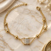 Oro Laminado Fancy Bracelet, Gold Filled Style with White Crystal, Polished, Golden Finish, 03.171.0002 (05 MM Thickness, 7 Inches Length)