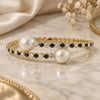 Oro Laminado Individual Bangle, Gold Filled Style Ball Design, with Black Crystal and White Pearl, Polished, Golden Finish, 07.63.0146 (03 MM Thickness, One size fits all)