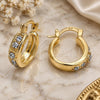 Oro Laminado Huggie Hoop, Gold Filled Style with White Cubic Zirconia, Polished, Golden Finish, 02.168.0032