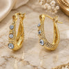 Oro Laminado Huggie Hoop, Gold Filled Style with White Crystal, Matte Finish, Golden Finish, 02.164.0044