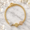 Oro Laminado Charm Bracelet, Gold Filled Style Feet and Rat Tail Design, Polished, Tricolor, 03.63.1180.07 (03 MM Thickness, 7 Inches Length)
