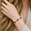 Oro Laminado Tennis Bracelet, Gold Filled Style Hugs and Kisses Design, with Sapphire Blue and White Cubic Zirconia, Polished, Golden Finish, 03.206.0001.1.07 (07 MM Thickness, 7 Inches Length)