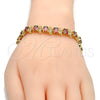 Oro Laminado Tennis Bracelet, Gold Filled Style with Garnet and White Cubic Zirconia, Polished, Golden Finish, 03.206.0007.3.07 (11 MM Thickness, 7 Inches Length)