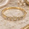 Oro Laminado Individual Bangle, Gold Filled Style with White Crystal, Polished, Golden Finish, 07.100.0006.04 (06 MM Thickness, Size 5 (2.50 Diameter))
