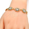 Gold Tone Fancy Bracelet, Flower and Rattle Charm Design, with White Crystal, Polished, Golden Finish, 03.270.0001.07.GT (04 MM Thickness, 7 Inches Length)