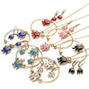 Oro Laminado Necklace, Bracelet and Earring, Gold Filled Style Elephant Design, with White Crystal, Blue Enamel Finish, Golden Finish, 06.63.0182.5.GT