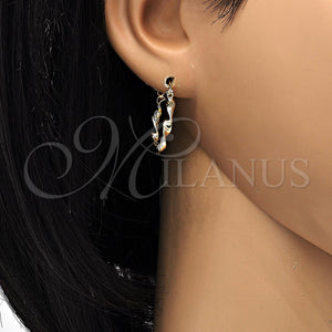 Gold Filled Hoop Earrings — Medium Hoop Twist Design Diamond Cutting 02. — main product view — SKU 118263 | Oro Laminado aretes de aro — Medium Hoop Twist diseño Diamond Cutting 02. — SKU 118263