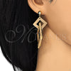 Oro Laminado Long Earring, Gold Filled Style Brown Resin Finish, Golden Finish, 02.268.0075.2