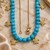 Oro Laminado Pendant Necklace, Gold Filled Style Turtle and Rat Tail Design, Blue Resin Finish, Golden Finish, 04.32.0008.4.18 (18 Inches Length)