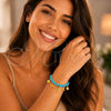 Oro Laminado Charm Bracelet, Gold Filled Style Fish Design, with Turquoise Pearl, Blue Polished, Golden Finish, 03.32.0183.07 (01 MM Thickness, 7 Inches Length)
