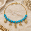 Oro Laminado Charm Bracelet, Gold Filled Style Fish Design, with Turquoise Pearl, Blue Polished, Golden Finish, 03.32.0183.07 (01 MM Thickness, 7 Inches Length)
