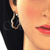 Gold Filled Hoop Earrings — Medium Hoop Twist Design Polished 02. — alternate product view — SKU 126600 | Oro Laminado aretes de aro — Medium Hoop Twist diseño pulido 02. — SKU 126600