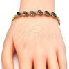 Oro Laminado Fancy Bracelet, Gold Filled Style Teardrop Design, with Black and White Cubic Zirconia, Polished, Golden Finish, 03.210.0101.07 (05 MM Thickness, 7 Inches Length)