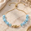 Oro Laminado Adjustable Bolo Bracelet, Gold Filled Style Turtle and Snake Design, with Aquamarine and Aqua Blue Crystal, Blue Polished, Golden Finish, 03.32.0233.07 (7 Inches Length)