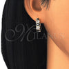 Oro Laminado Huggie Hoop, Gold Filled Style with Black and White Cubic Zirconia, Polished, Golden Finish, 02.210.0025.4.15