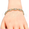 Oro Laminado Fancy Bracelet, Gold Filled Style Elephant and Fish Design, with Multicolor Cubic Zirconia, Polished, Golden Finish, 03.316.0031.3.07 (05 MM Thickness, 7 Inches Length)