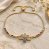 Oro Laminado Adjustable Bolo Bracelet, Gold Filled Style Cross Design, with Multicolor Micro Pave and Multicolor Cubic Zirconia, Polished, Golden Finish, 03.299.0022.11 (01 MM Thickness, 11 Inches Length)