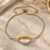 Oro Laminado Adjustable Bolo Bracelet, Gold Filled Style with White Cubic Zirconia, White Enamel Finish, Golden Finish, 03.207.0098.10 (01 MM Thickness, 10 Inches Length)