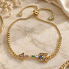 Oro Laminado Adjustable Bolo Bracelet, Gold Filled Style Baguette Design, with Multicolor Cubic Zirconia and White Micro Pave, Polished, Golden Finish, 03.341.0005.11 (01 MM Thickness, 11 Inches Length)