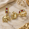Oro Laminado Huggie Hoop, Gold Filled Style Elephant Design, with Garnet and White Crystal, Polished, Golden Finish, 02.94.0106.1