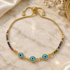 Oro Laminado Adjustable Bolo Bracelet, Gold Filled Style Evil Eye Design, with Multicolor Cubic Zirconia, Azul claro Resin Finish, Golden Finish, 03.63.2084.2.11 (01 MM Thickness, 11 Inches Length)