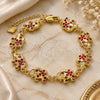 Oro Laminado Fancy Bracelet, Gold Filled Style Elephant Design, with Garnet Crystal, Polished, Golden Finish, 03.351.0050.1.07 (10 MM Thickness, 7 Inches Length)
